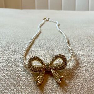 Camila Coelho pearl and gold Bow Necklace